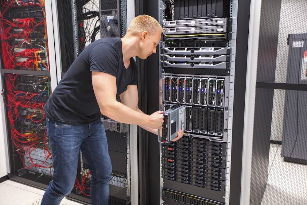 a man in a a Server center