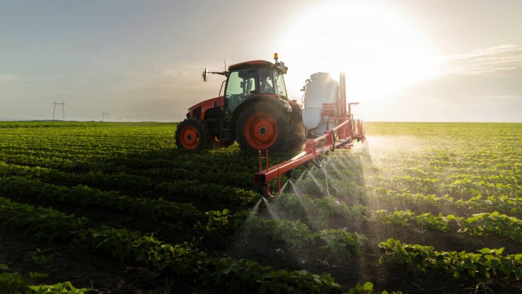 Farm and tractor in the evening 