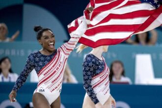 Simone Biles with flag