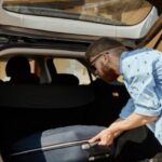 A man Transporting items by car